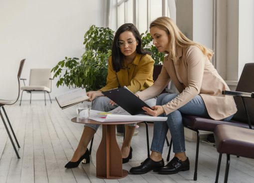 businesswomen working project together